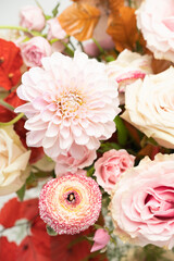 Obraz na płótnie Canvas Close up of flower background with fresh pink dahlias and roses