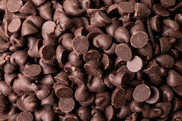 Full frame close-up view of fresh chocolate chips pile