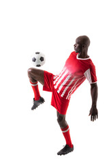Skilled male african american soccer player kicking ball over white background © WavebreakMediaMicro