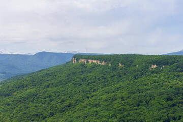 summer, a natural mountain park, walks in the bosom of nature on a sunny day.