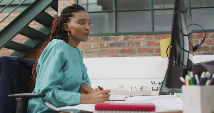 Thoughtful african american businesswoman working at office