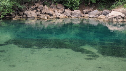Fototapeta na wymiar Blue lagoon or Nature water form limestone mountains