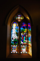 Fototapeta na wymiar Stained glass window in Our Lady of the Rosary Catholic Church - Kyneton, Victoria, Australia