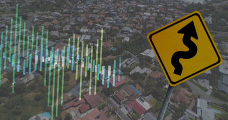 Image of financial data processing over road sign and cityscape