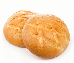 Traditional homemade round bread isolated on a white background