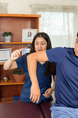 Physical therapist using an orthopedic hammer