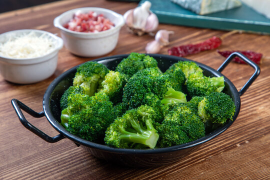 vegetarian food boiled broccoli in metal pan 