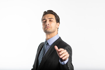 Arrogant businessman demonstrating irritation and haughtiness with hand gesture and face expression isolated on white background - obrazy, fototapety, plakaty