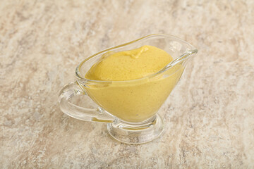Organic mustard sauce in the bowl