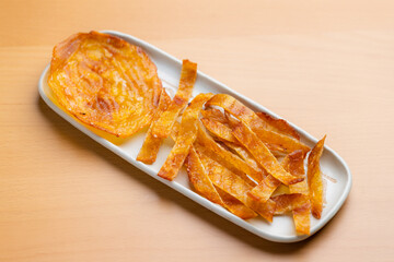Cooked dried fish fillet snack