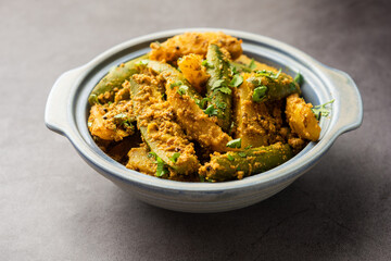 Aloo Potol or Dalna Recipe is a traditional sabzi from bengal made with potato & pointed gourd