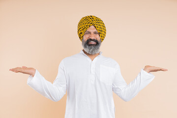 Indian Sikh man with open hand  display product