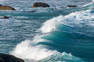 White sea foam on the coastal waves of the Atlantic Ocean.