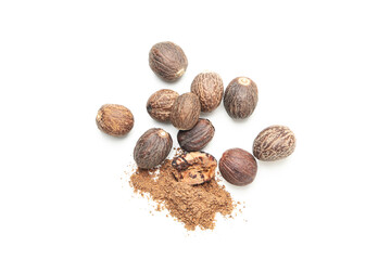 Nutmeg and nutmeg powder on light background