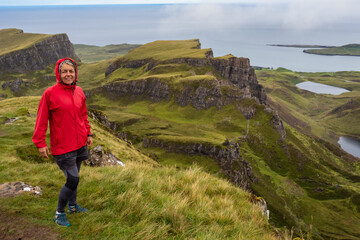 Female hiker hiking the Quiraing on the Isle of Skye in Scotland	