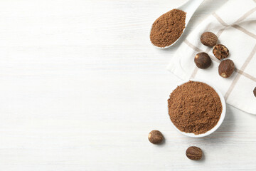 Concept of spices and condiments, nutmeg powder, space for text - obrazy, fototapety, plakaty
