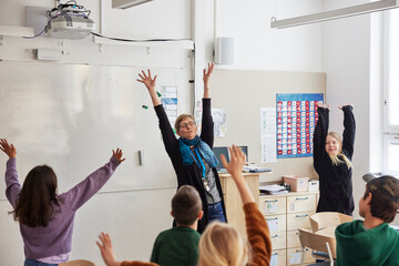 Teacher and children in classroom