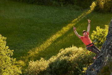 High angle view of man rock climbing