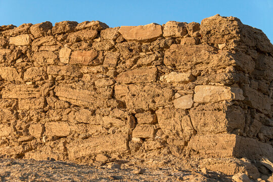 northeast corner of the ancient Nabatean limestone fortress at Khirbet Moah guards the Spice Route in the Arava Desert in Israel