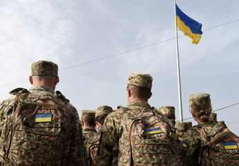 Armed Forces of Ukraine. Ukrainian soldier. Ukrainian in army. Ukrainian flag on military uniform.