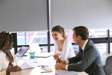 Shot of a group of businesspeople in a meeting at work