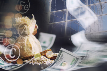 World grain crisis. Double exposure. A handful of cereals and 100 dollar banknotes on a blue...