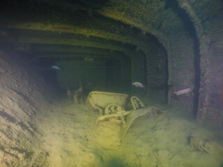 Diving on the ship wrecks of the Palau archipelago. These ship wrecks were from Japanese Navy at...