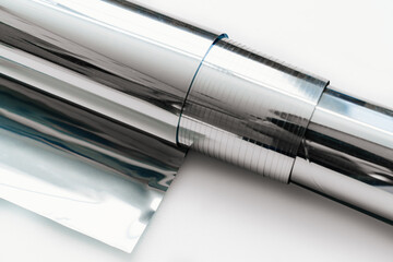 a roll of foil for baking on a white background. 