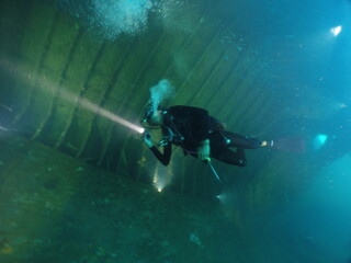 Diving on the ship wrecks of the Palau archipelago. These ship wrecks were from Japanese Navy at...