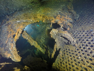 Diving on the ship wrecks of the Palau archipelago. These ship wrecks were from Japanese Navy at...