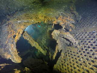 Diving on the ship wrecks of the Palau archipelago. These ship wrecks were from Japanese Navy at WW2.