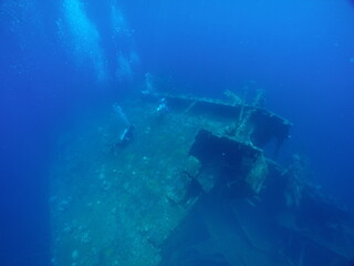 Diving on the ship wrecks of the Palau archipelago. These ship wrecks were from Japanese Navy at...