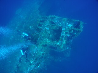 Diving on the ship wrecks of the Palau archipelago. These ship wrecks were from Japanese Navy at WW2.