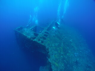 Diving on the ship wrecks of the Palau archipelago. These ship wrecks were from Japanese Navy at...