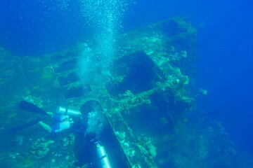 Fototapeta na wymiar Diving on the ship wrecks of the Palau archipelago. These ship wrecks were from Japanese Navy at WW2.