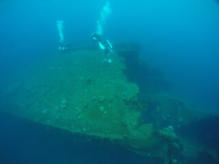 Diving on the ship wrecks of the Palau archipelago. These ship wrecks were from Japanese Navy at...