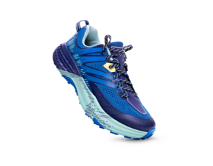 A front view of blue trainers, sneakers Isolated on a flat background.