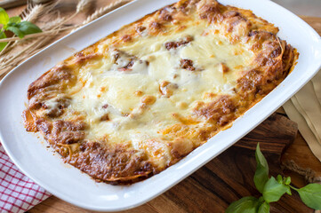 Lasagne Bolognese fresh and homemade cooked with mozzarella cheese topping