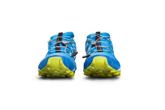 A front view of blue and yellow trainers, sneakers Isolated on a flat background.