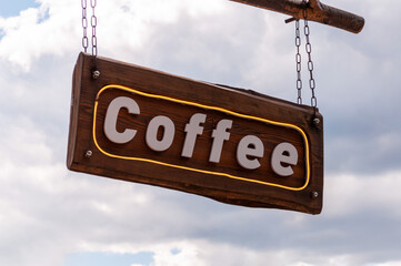 Vintage style sign for black filtered coffee on a blackboard with a wooden frame. Landscape format.