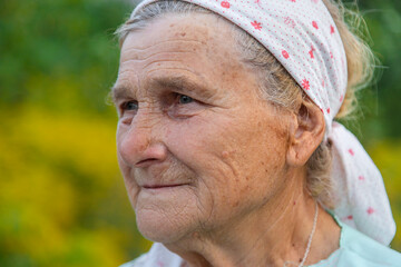 Beautiful portrait of an old woman. Selective focus.