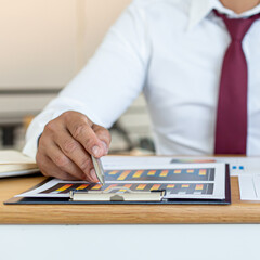 Young business men analyze financial data in mobile phones, Calculation of investment income and expenditure using modern technology and internet, Transport and online communication concept.