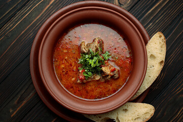 Kharcho soup with meat, bread and herbs