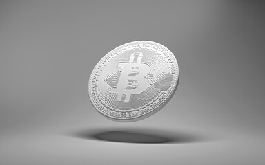 Dropping white clean bitcoin on white background.