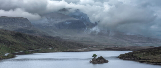 Clouds rolling over Old Man of Storr on Isle of Skye
