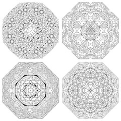 Hand drawn zentangle set of 4 mandalas for coloring page.