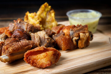 Traditional Colombian food with fried meat and banana