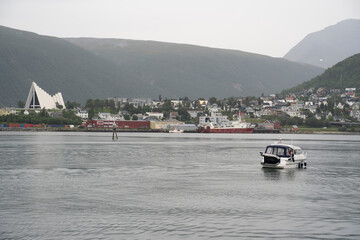 Obraz premium boat sailing in the port of Tromso, northern Norway