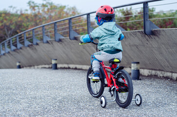 child on bike