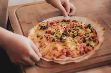 person holding pizza